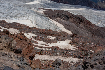 GaraBashi glacier tongue on the Elbrus volcano. In the background you can see the second tongue of GaraBashi glacier. Southeast side of Elbrus. Altitude 3700 m. July 2020