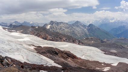 Panoramic view of the Elbrus glacier, named GaraBashi. In the foreground we can see the 2 tongues of GaraBashi glacier. on the right in the background you can see A scientific station of the Institute