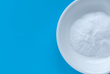 ORS or oral rehydration salt on blue background.