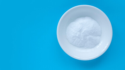ORS or oral rehydration salt on blue background.