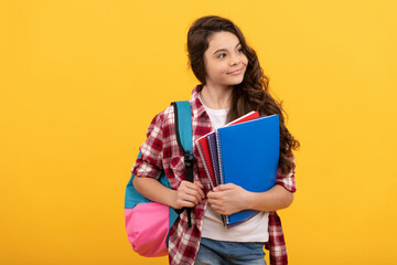 education and knowledge. high school. schoolgirl with notebook and backpack.