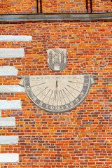 Sundial made using the sgraffito technique on the wall of Sandomierz gothic Town Hall, Sandomierz, Poland