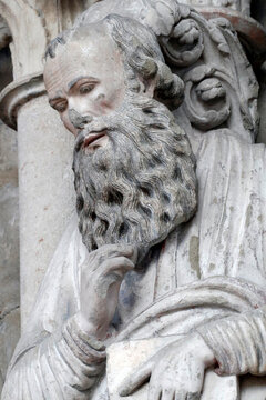 Saint Luke, the evangelist. Painted portal.  Cathedral of Notre Dame of Lausanne.  Switzerland.