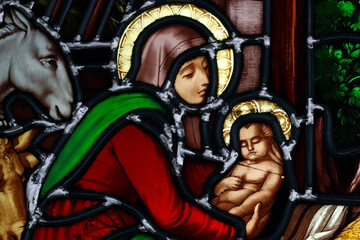 Fototapeta premium Notre Dame ( our Lady ) d'Aix les Bains church. Stained glass window. Virgin Mary and baby Jesus. Aix les Bains. France.