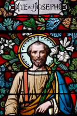Fototapeta na wymiar Notre Dame ( our Lady ) d'Aix les Bains church. Stained glass window. Saint Joseph. Aix les Bains. France.