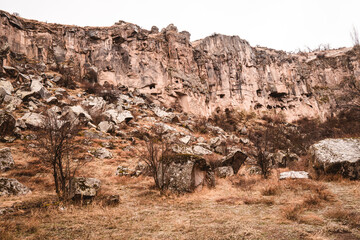 Panorama view of the landscapes inside the canyon of the Ihlara Valley in Cappadocia, Turkey on a rainy day in autumn