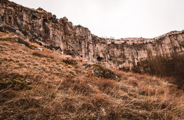 Panorama view of the landscapes inside the canyon of the Ihlara Valley in Cappadocia, Turkey on a rainy day in autumn