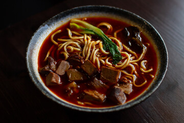 Homemade Chinese Beef Lo Mein Noodles Soup with Broccoli. 