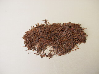 Loose Lapacho tea on a wooden board