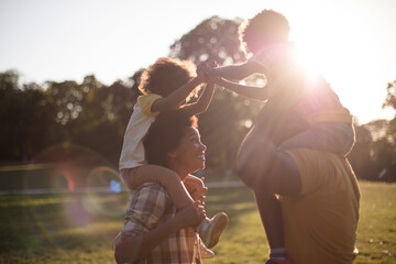 African American family having fun outdoors.