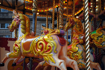Close Up of Colourful Painted Horses on Fairground Ride