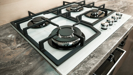 Modern white glass Gas stove wok burner for a large pan . Double gas burner wok. The style of the kitchen. Modern design.