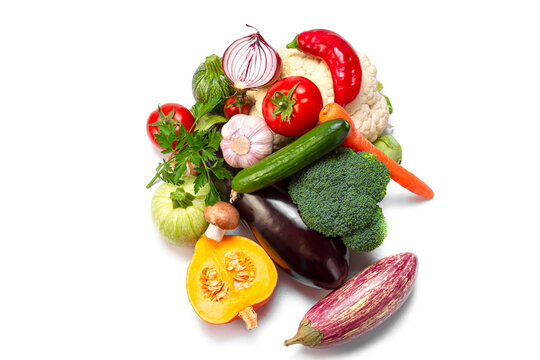 Fresh organic vegetables  on a white isolated background. Photo top view. Balanced nutrition concept.