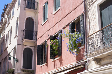 Naklejka premium facades of the narrow streets of the old city of Venice