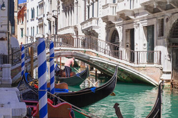 Fototapeta na wymiar romantic idyllic views of the narrow canal street and renaissance facades of the city of Venice