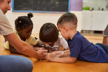 Children play together in kindergarten or after-school care