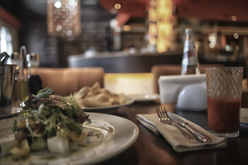 interior restaurant tableware / cutlery and tableware on a table in a cafe, beautiful catering industry