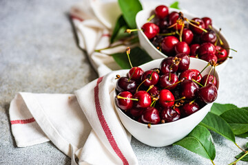 Sweet cherries on concrete background
