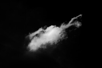 white clouds on a black sky