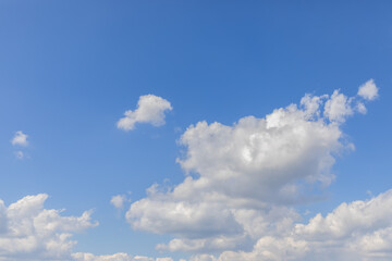 Blue beautiful sky with fresh white clouds