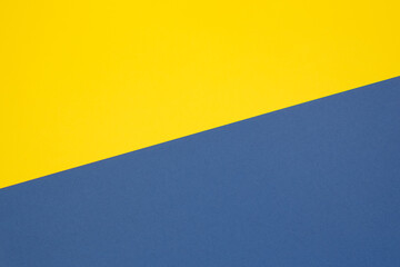 Two-color background made with diagonal line. Yellow and blue colorway