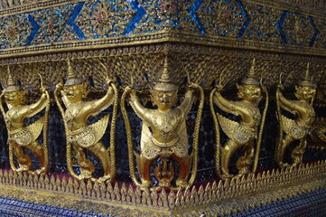 Mythological figures decorating the Temple of the Emerald Buddha, Wat Phra Kaew, in the Royal Palace complex in Bangkok.
