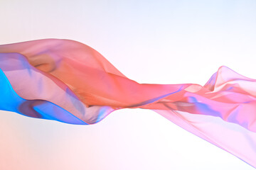 Smooth elegant colorful transparent cloth separated on white background. Texture of flying fabric.