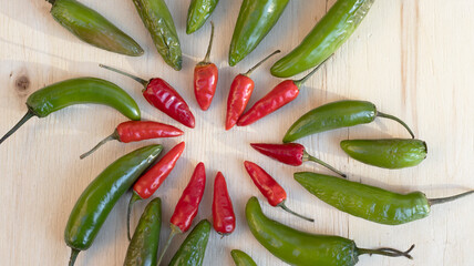 Chilies on a light wooden board