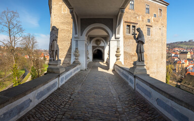 The Cloak Bridge with statues - castle Cesky Krumlov, Czech republic