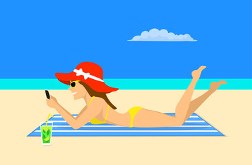 girl lying on striped towel on the beach, texting on smartphone, relaxing, and sunbathing