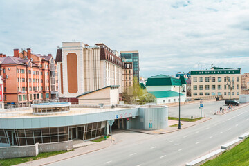  Streets of Kazan, panoramic view of the city on a summer day, buildings and architecture of the city. Kazan, Russia - 8 May 2021