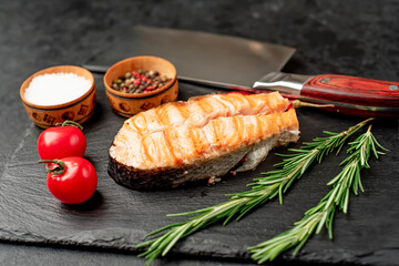 grilled salmon on a stone background