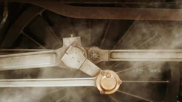 Stunning detail of a steam locomotive preparing to depart on a heritage trip