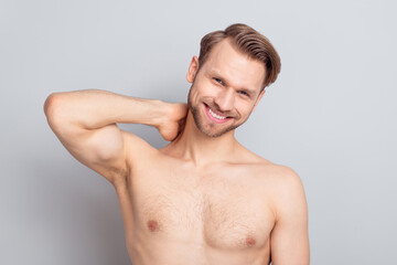 Fototapeta na wymiar Photo of sexy blond hairdo guy touch neck without clothes isolated on grey color background