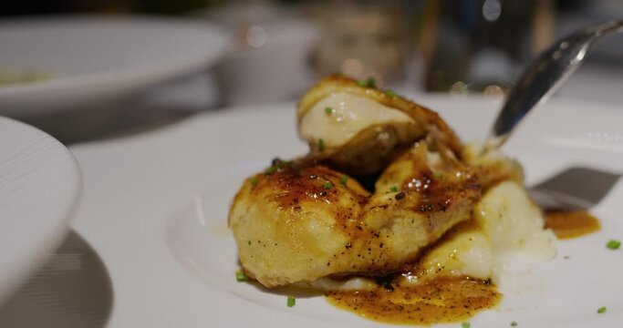Roasted spring chicken on plate