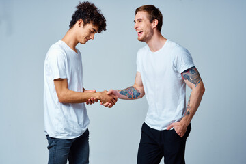 two friends holding hands positive isolated background