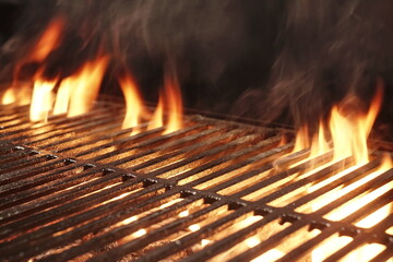 Empty Flaming BBQ Charcoal Grill, Closeup. Hot Barbeque Grill Ready Cooking Food On Cast Iron Grate. Concept For Cookout, Barbecue Party At Garden Or Backyard. Grill With Bright Flames Black Isolated. - obrazy, fototapety, plakaty
