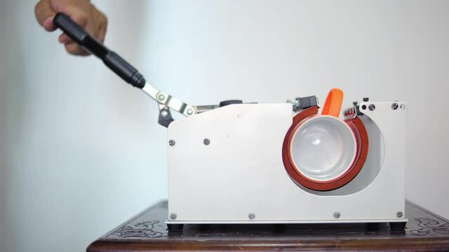 Thermal transfer print picture or some text on orange mug