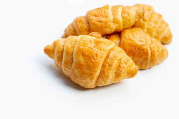 Tasty croissants on white background.
