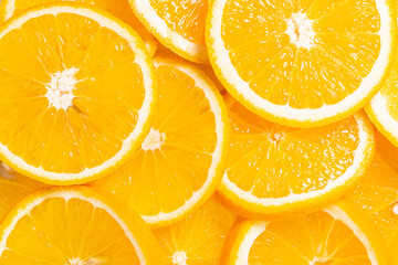 Sliced orange background. Orange fruit top view