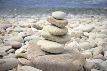 Fototapeta na wymiar A pile of stones in a beach