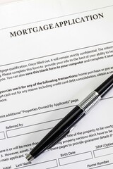 Mortgage application Form document closeup for use in a business concept