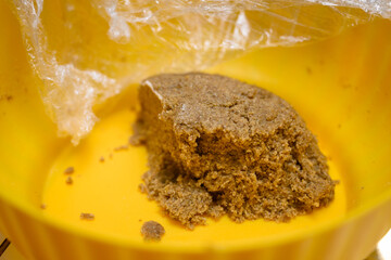 Gingerbread dough in a yellow bowl.