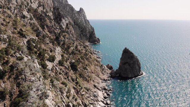 Aerial view, flight along beach by the sea.