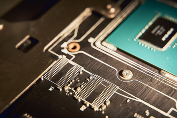 Computers video card with an empty space for memory chips. GPU without chip in GDDR memory slot....