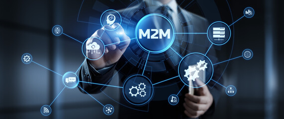 M2M Machine to machine industrial technology concept. Businessman pressing button