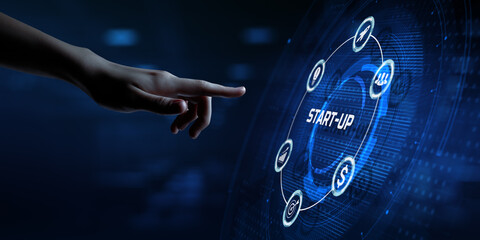 Startup new business development concept. Hand pressing button on screen