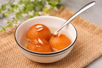 Indian sweet food Gulab jamun , gulaab jamun, jam Egyptian Zalabia balls dessert mithai freshly fried  in sugar syrup or sprinkled with powdered sugar. Prepare use milk solids on Ramadan, Diwali India