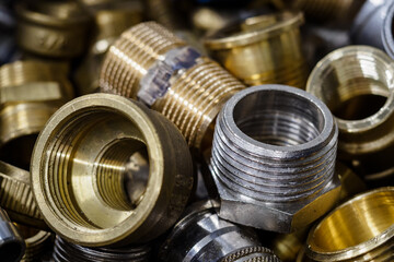 Screwed brass and metal threaded couplings.