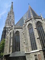 Fototapeta na wymiar Stephansdom Cathedral in Vienna, Austria, with Spires Reaching for the Skies and Large Gothic Style Windows